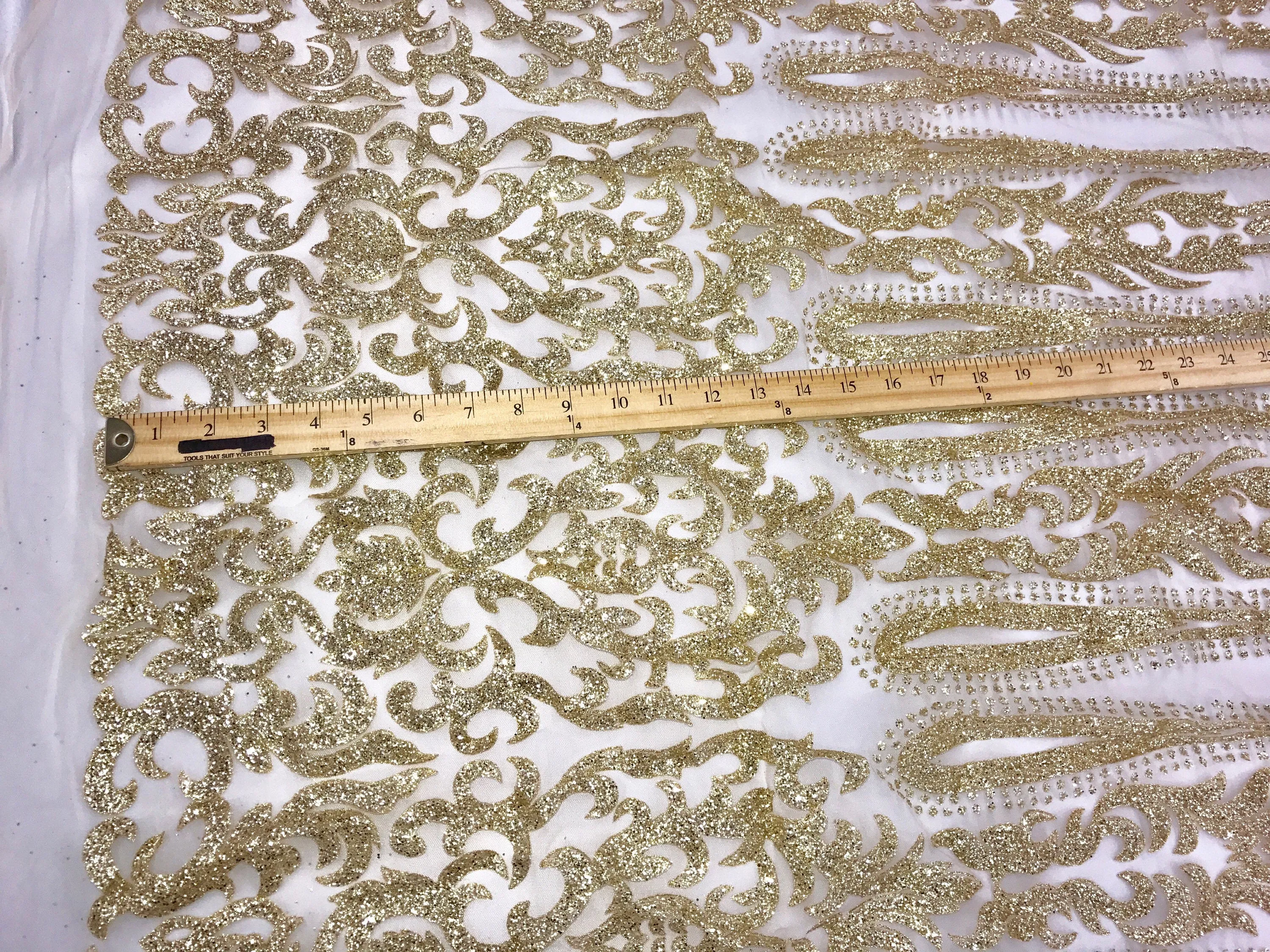 Gold shiny glitter damask design on a mesh lace-prom-decorations-apparel-fashion-nightgown-dresses-sold by the yard.