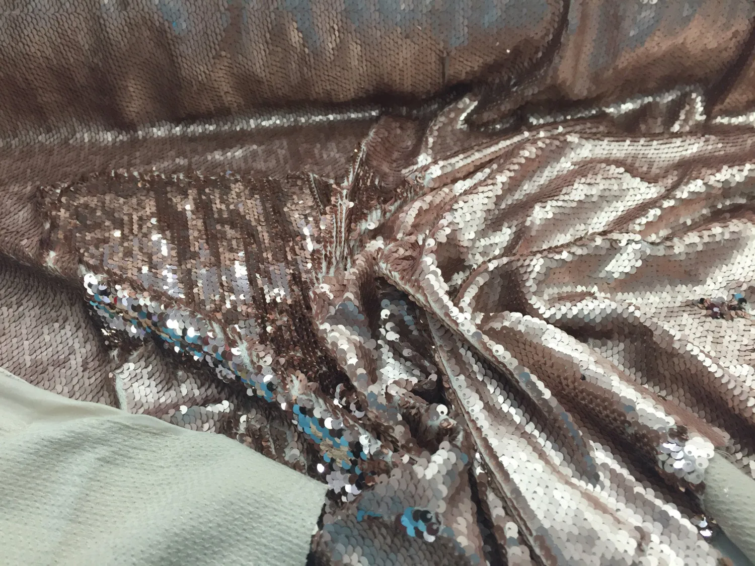 Matt gold/shinny rose gold hologram mermaid fish scales- 2 way stretch lycra- 2 tone flip flop sequins- sold by the yard.