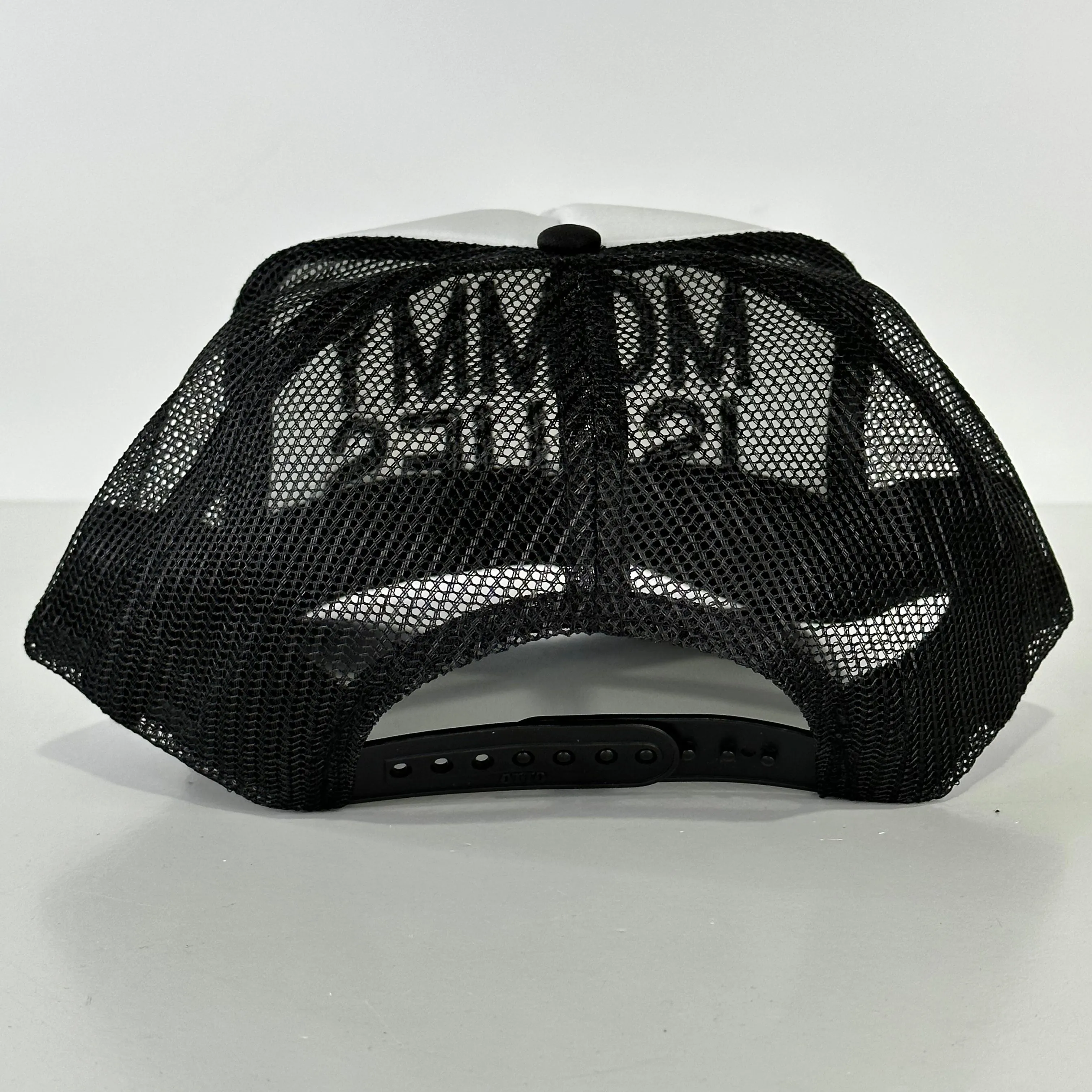 Mommy Issues on a black and white mesh trucker SnapBack cap hat custom embroidered