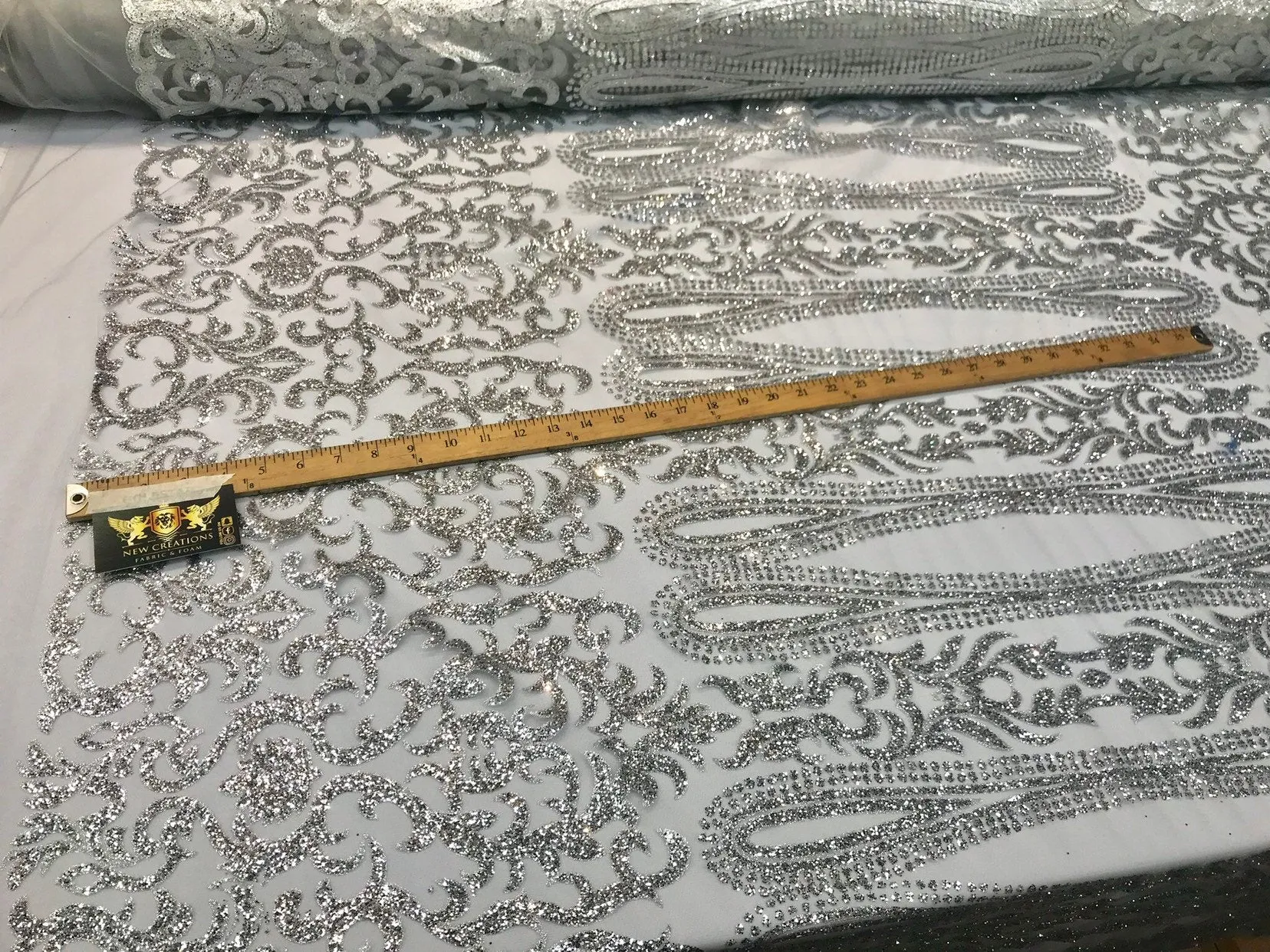 Silver shiny glitter damask design on a mesh lace-dresses-fashion-apparel-prom-nightgown-decorations-sold by the yard.