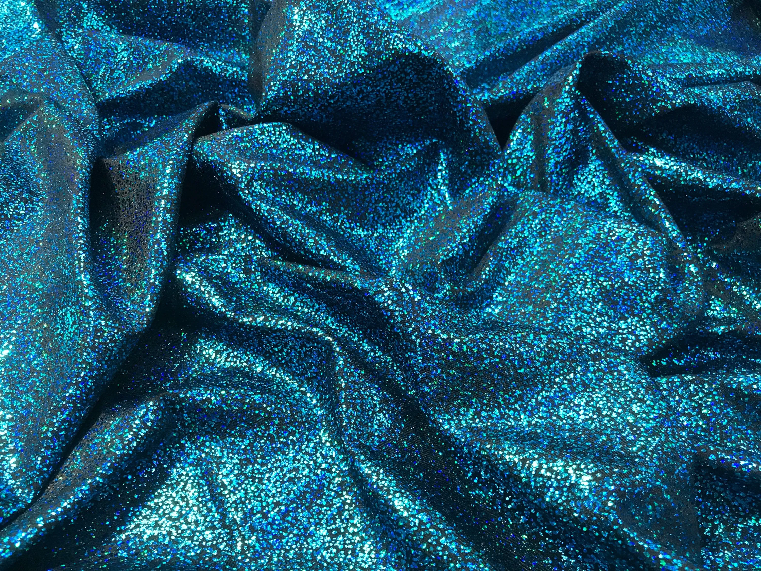 Turquoise-black iridescent shattered glass design 4 way Stretch nelon spandex-leggings-dresses-bathing suits-apparel-sold by the yard.