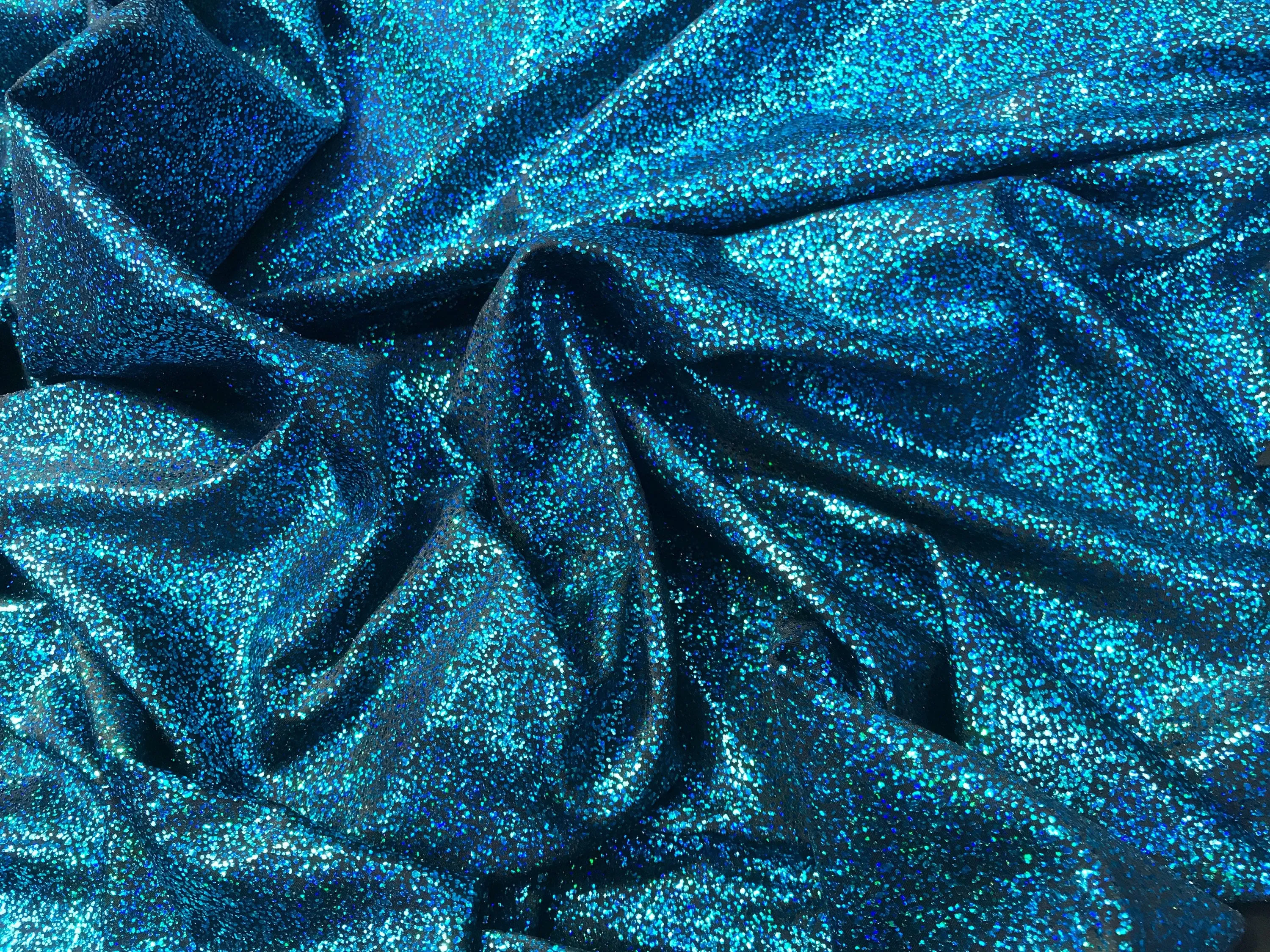 Turquoise-black iridescent shattered glass design 4 way Stretch nelon spandex-leggings-dresses-bathing suits-apparel-sold by the yard.
