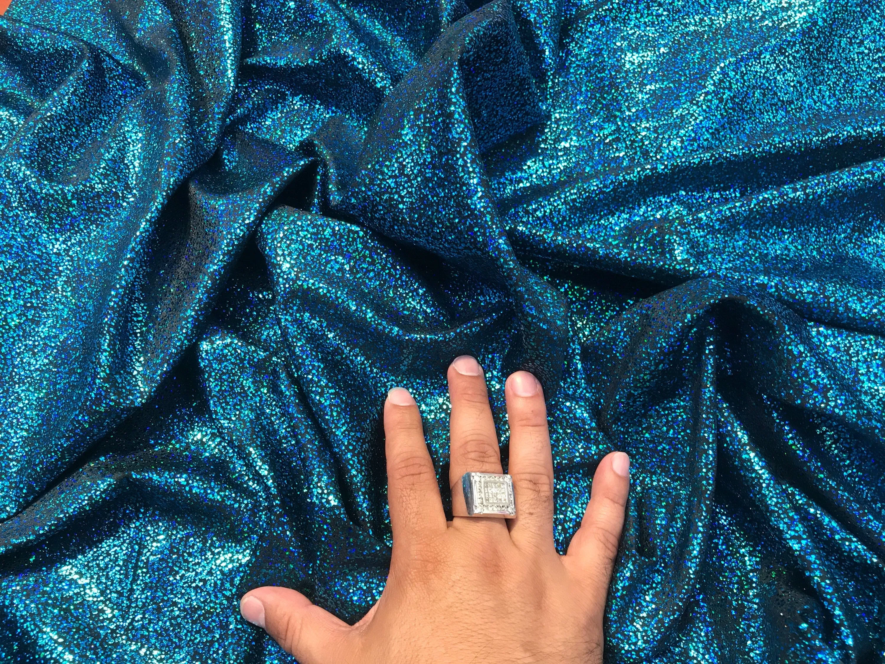 Turquoise-black iridescent shattered glass design 4 way Stretch nelon spandex-leggings-dresses-bathing suits-apparel-sold by the yard.