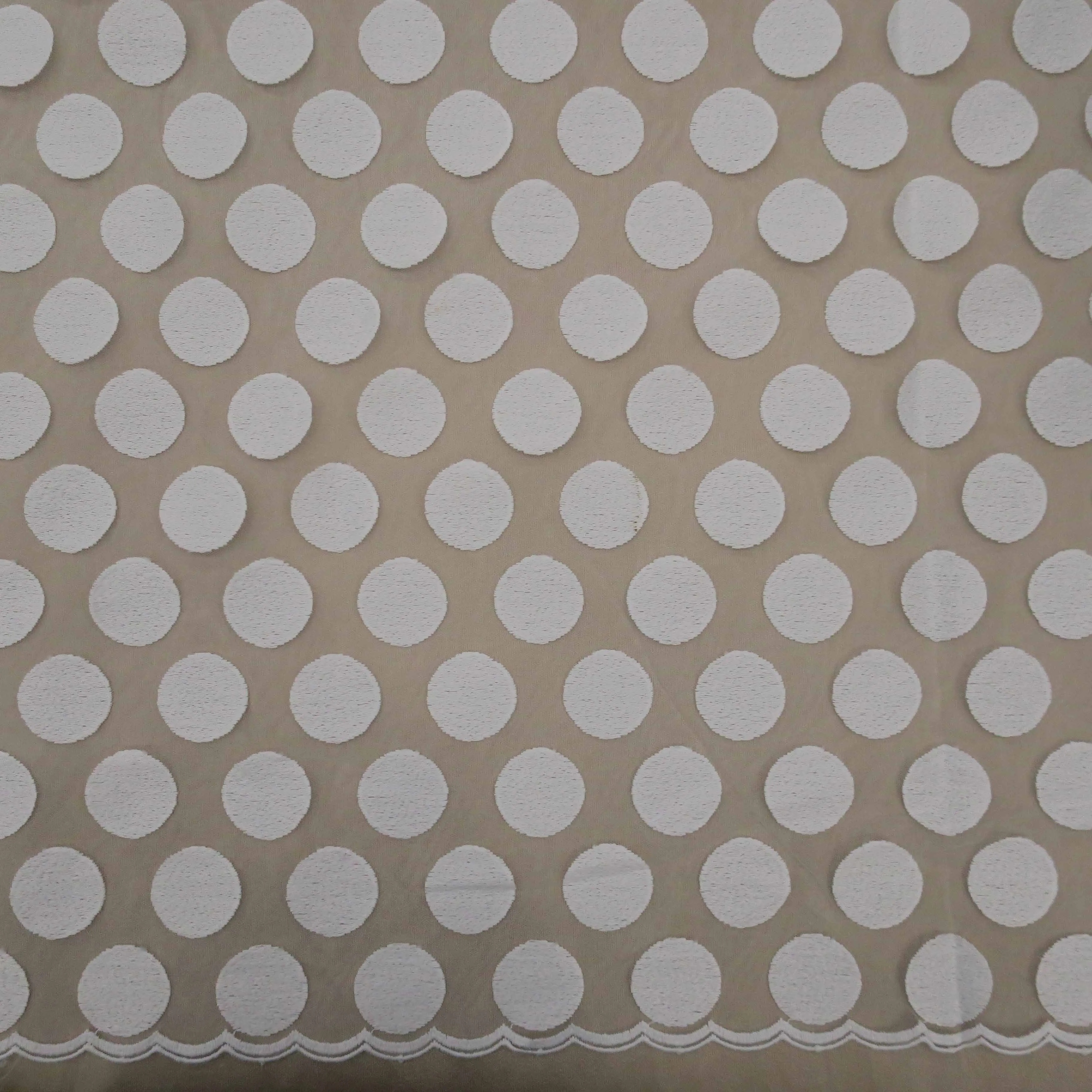 White Ovals Embroidered Tulle Fabric
