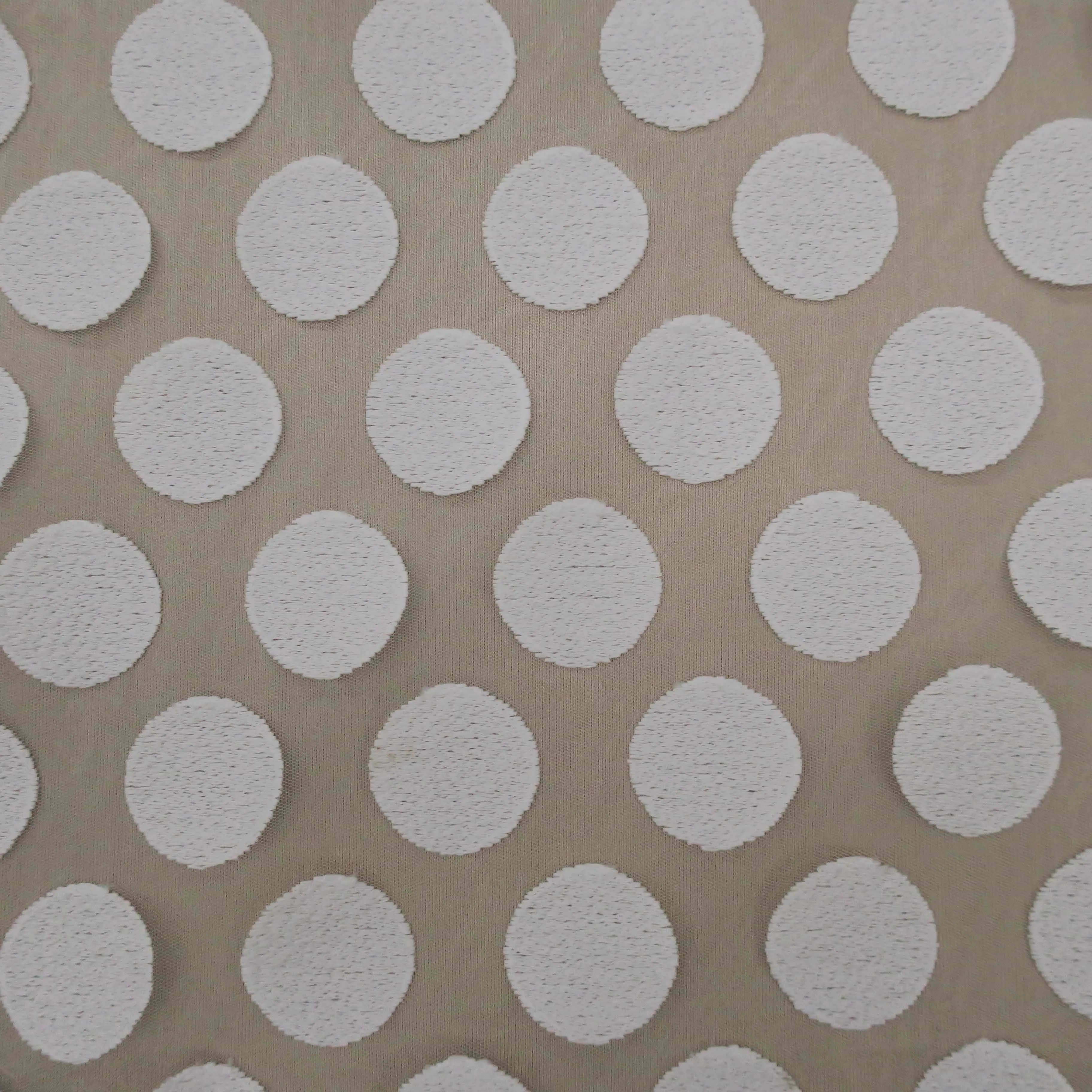 White Ovals Embroidered Tulle Fabric