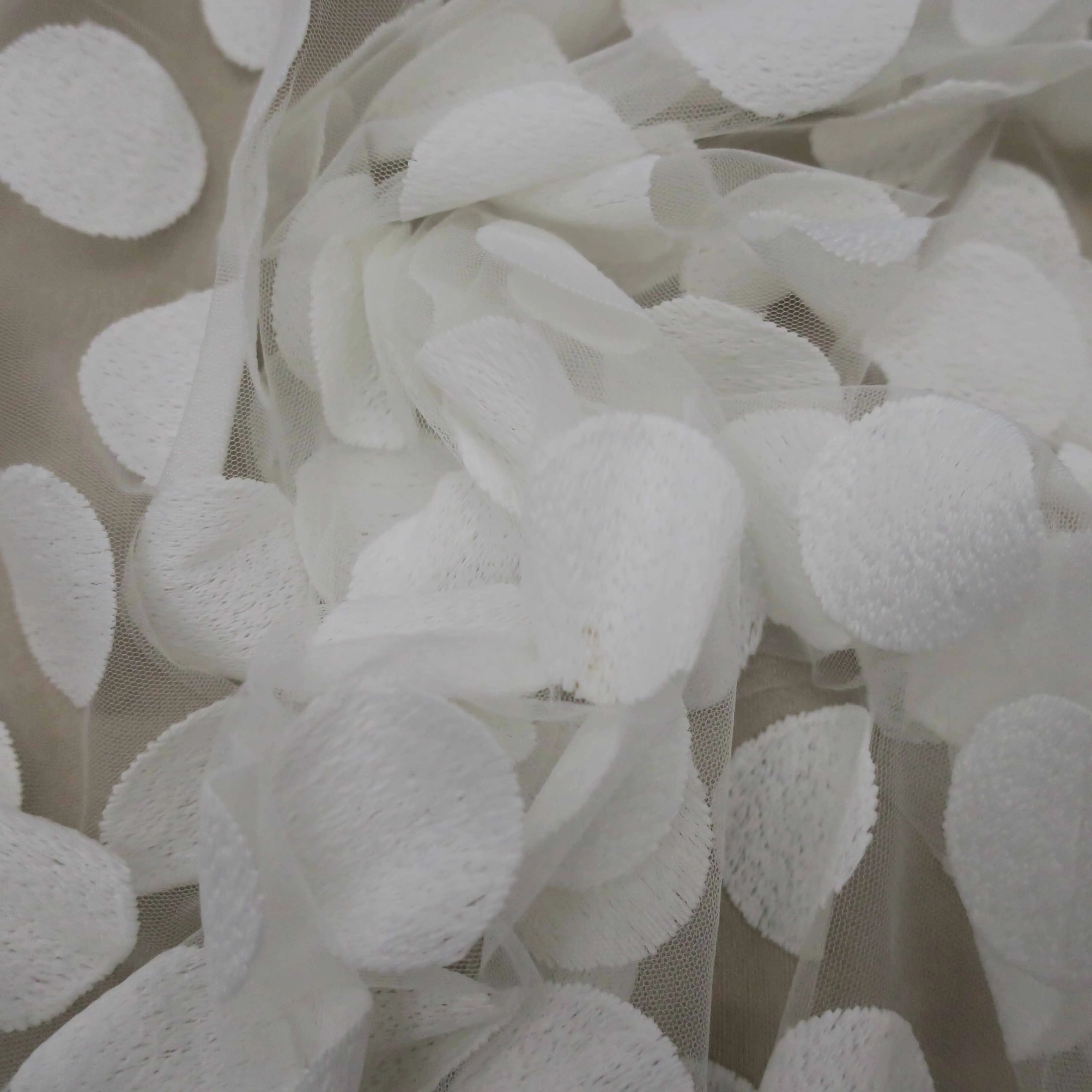White Ovals Embroidered Tulle Fabric